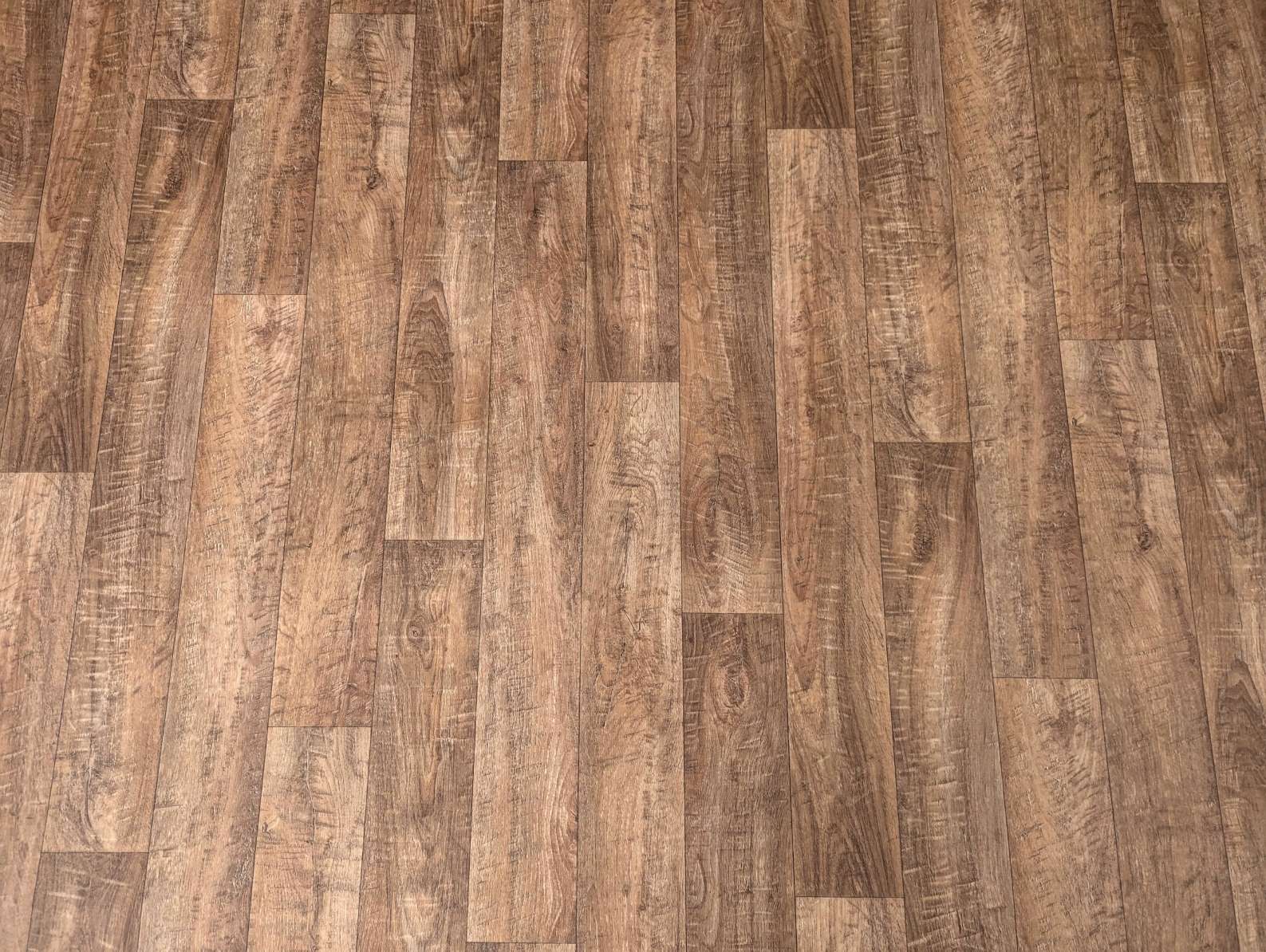PVC Bodenbelag Vinylboden in natürlicher Holz Plankenoptik in warmen Brauntönen