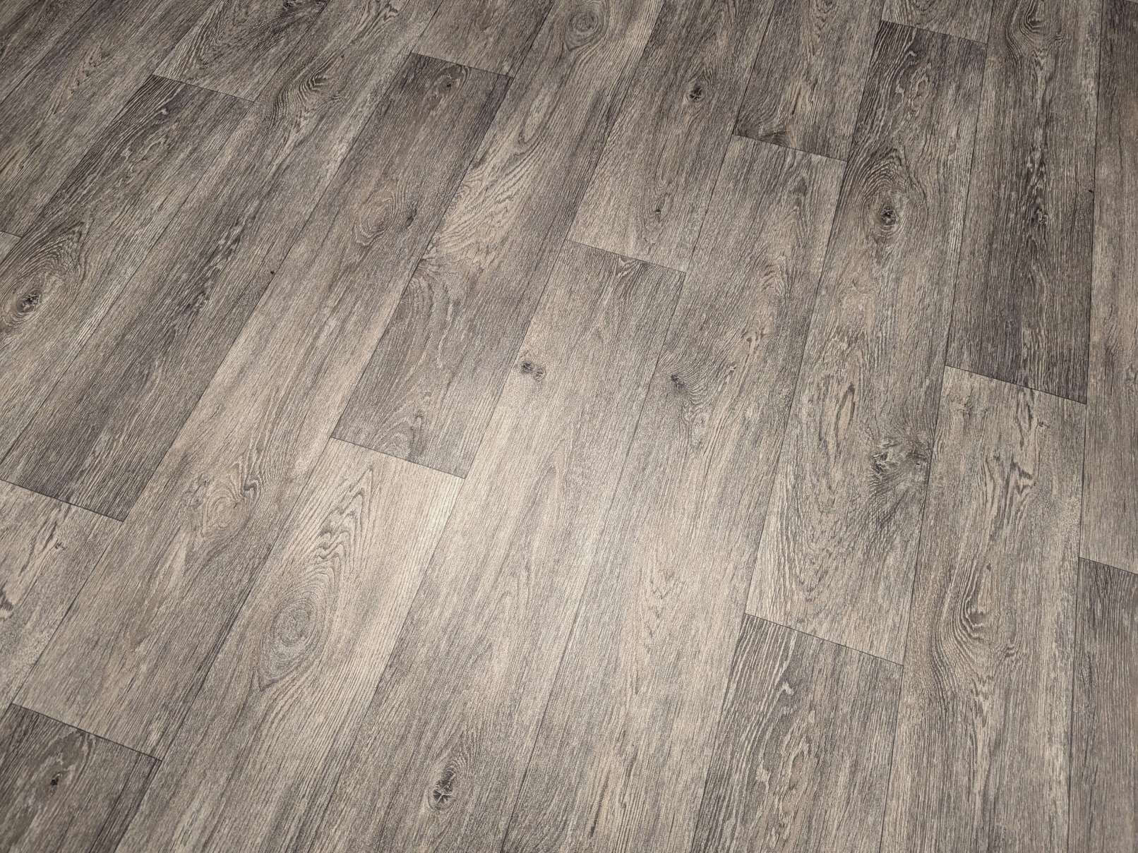 PVC Bodenbelag Vinylboden mit breiten Landhausdielen in feiner Maserung