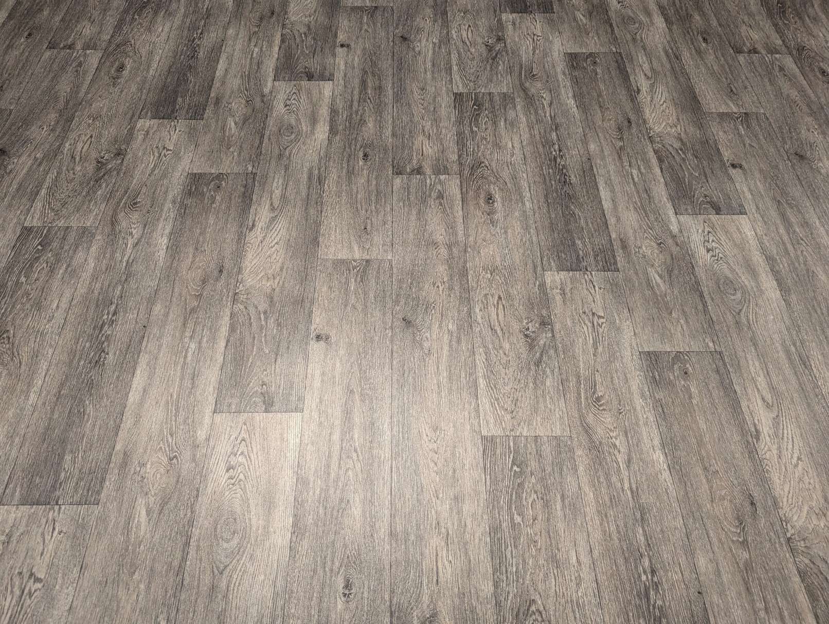 PVC Bodenbelag Vinylboden mit breiten Landhausdielen in feiner Maserung