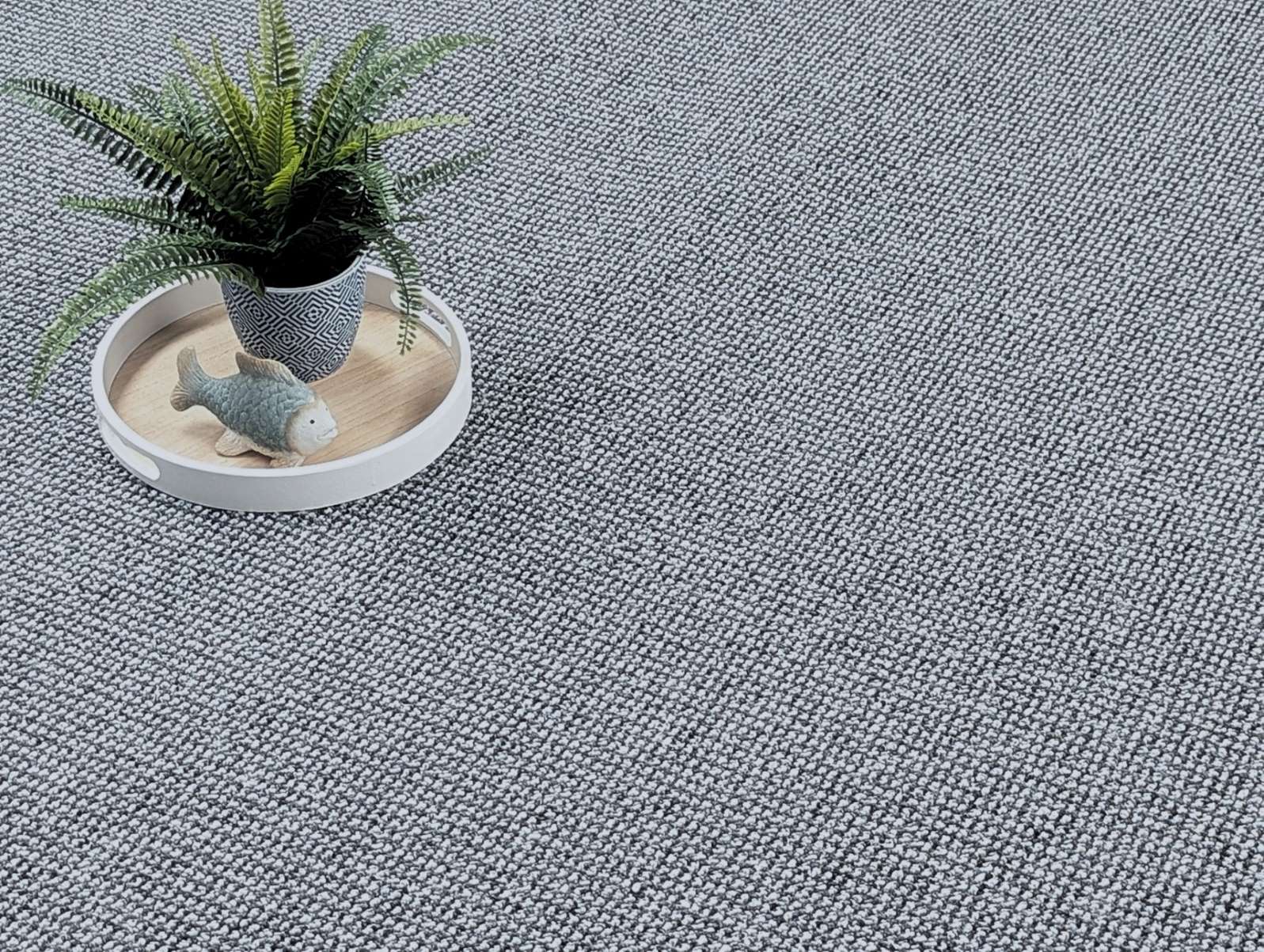 Teppichboden/ Bodenbelag in robuster Schlingenware grau für den Wohnbereich