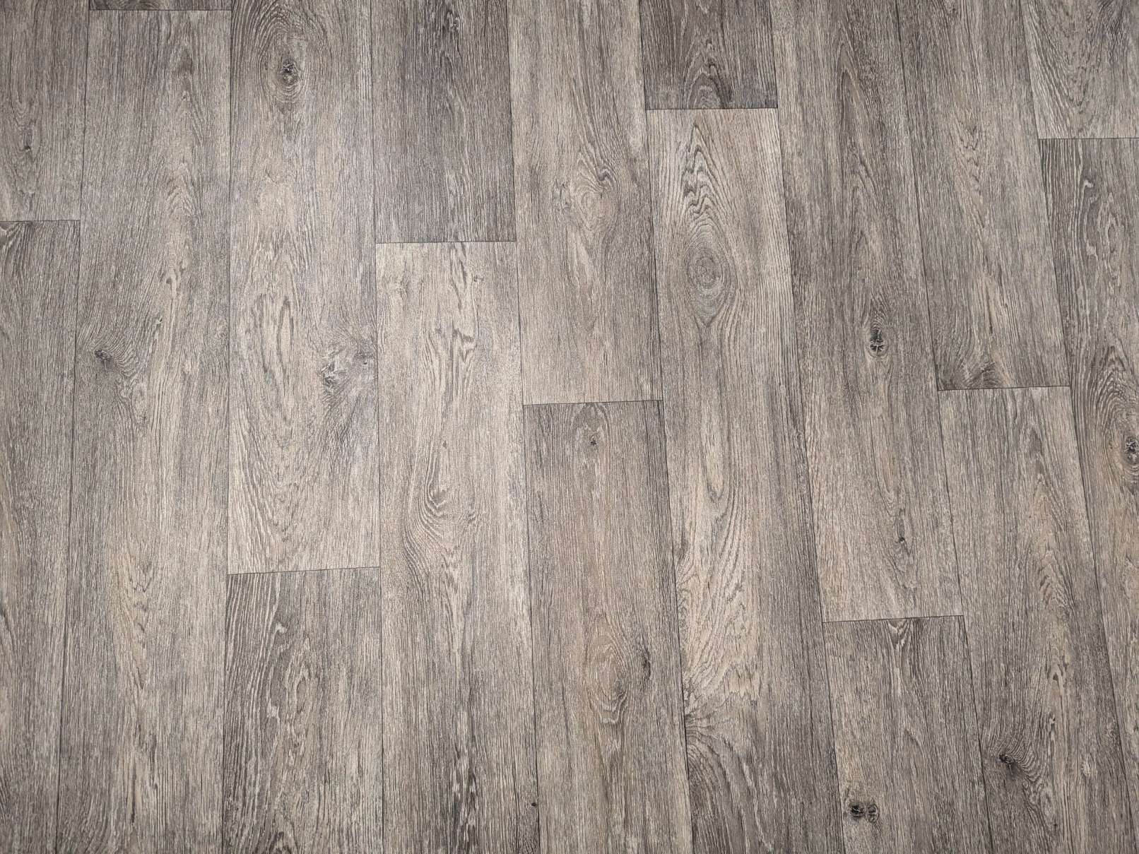 PVC Bodenbelag Vinylboden mit breiten Landhausdielen in feiner Maserung